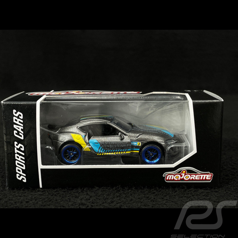 Toyota GR Supra Racing Sports Premium Showbox Grau / Gelb / Blau 1/59 Majorette 212052793STB
