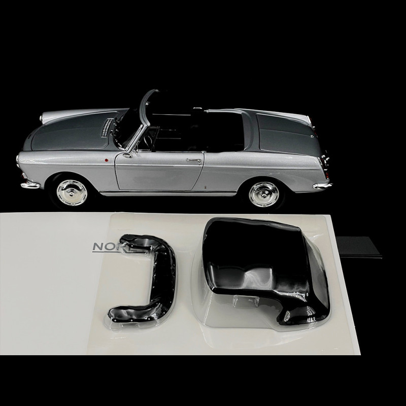 Voiture à friction de couleur bleu - PEUGEOT 404 bâchée fermé de 1968 Voiture à friction de couleur bleu - PEUGEOT 404 bâchée fermé de 1968
